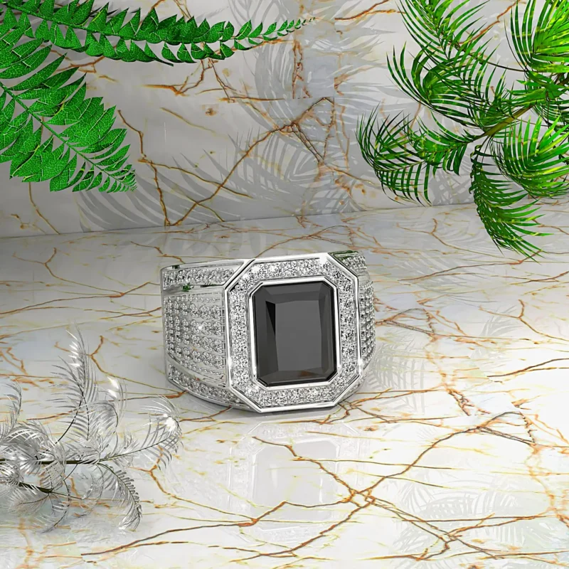 Bague arabe onyx homme en argent 925 poli sur un sol en marbre doré, onyx noir central et pierres scintillantes, ajustable et unique, cadeau luxe.